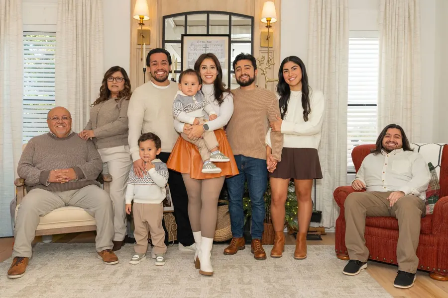 Extended family together at home